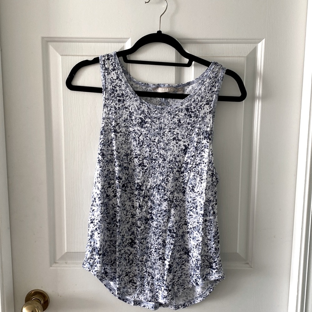 Athleta yoga/exercise loose fitting top. Cut out in back. Size medium.